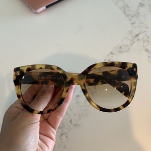 Prada women’s Tortoise Sunglasses